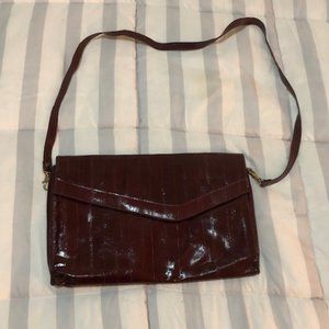 Beautiful oxblood leather clutch/handbag with shoulder strap